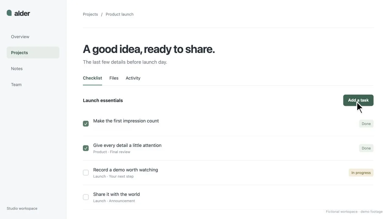 Wide 16:9 frame of a project checklist, with the cursor on the Add a task button.